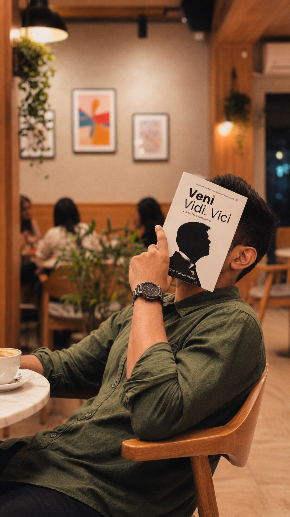 Reader with Veni Vidi Vici book